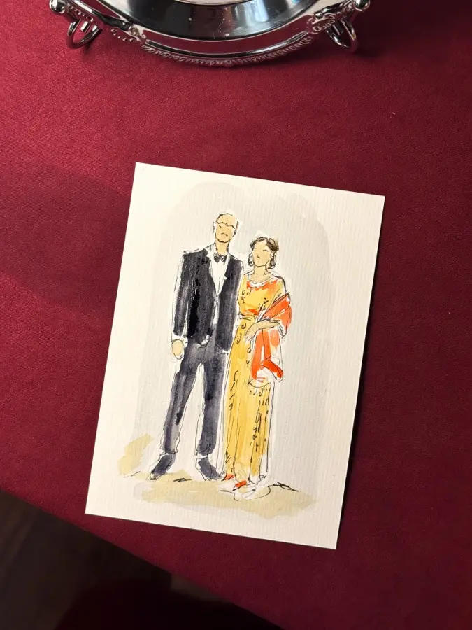 Akvarelni portret para, ona u narančastom